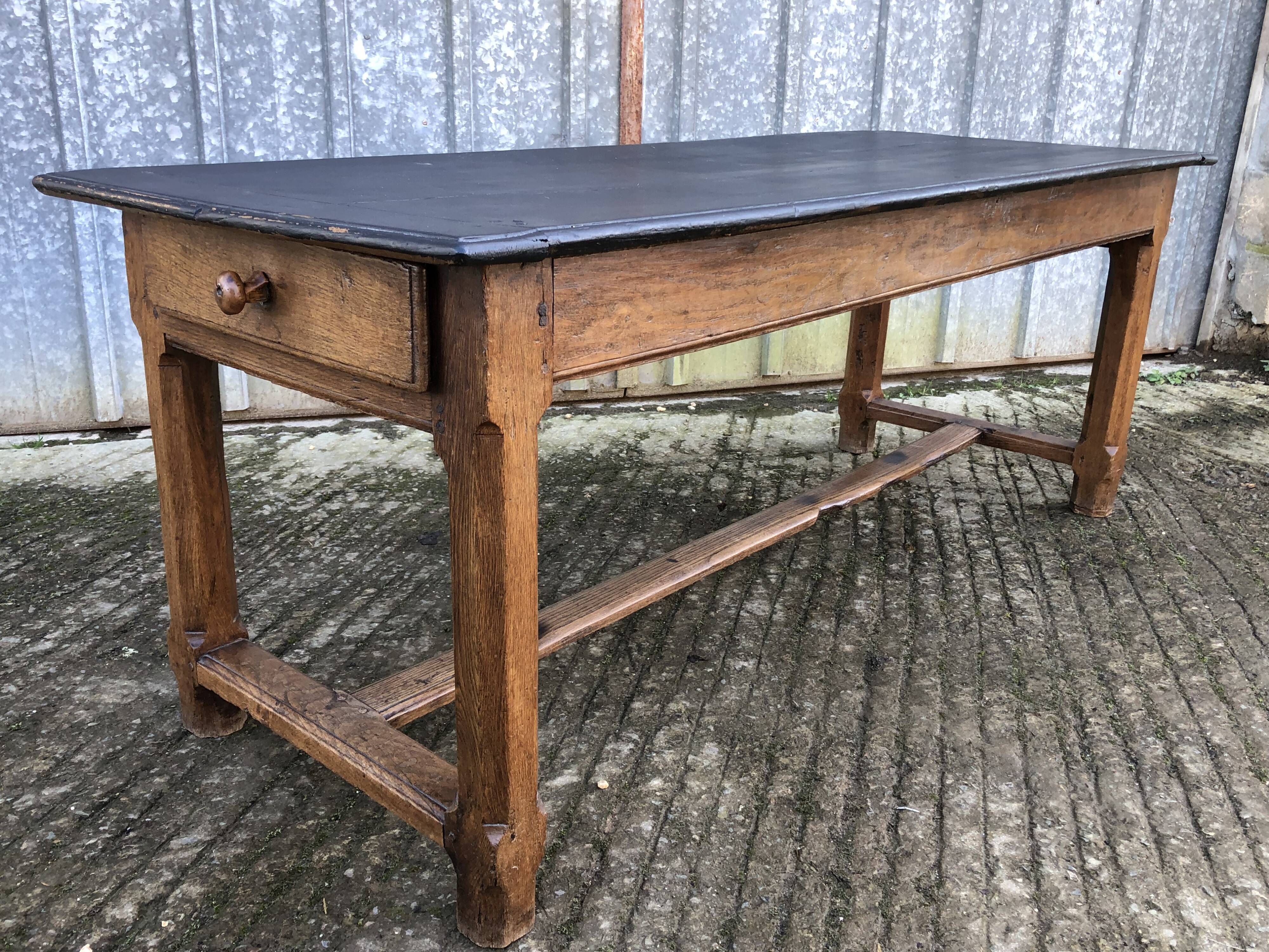 Antique oak farmhouse table with cat bar and 2 end drawers