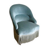 Toad in blue velvet armchair