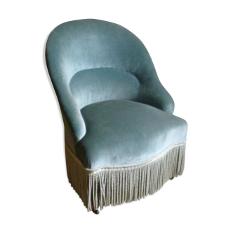 Toad in blue velvet armchair