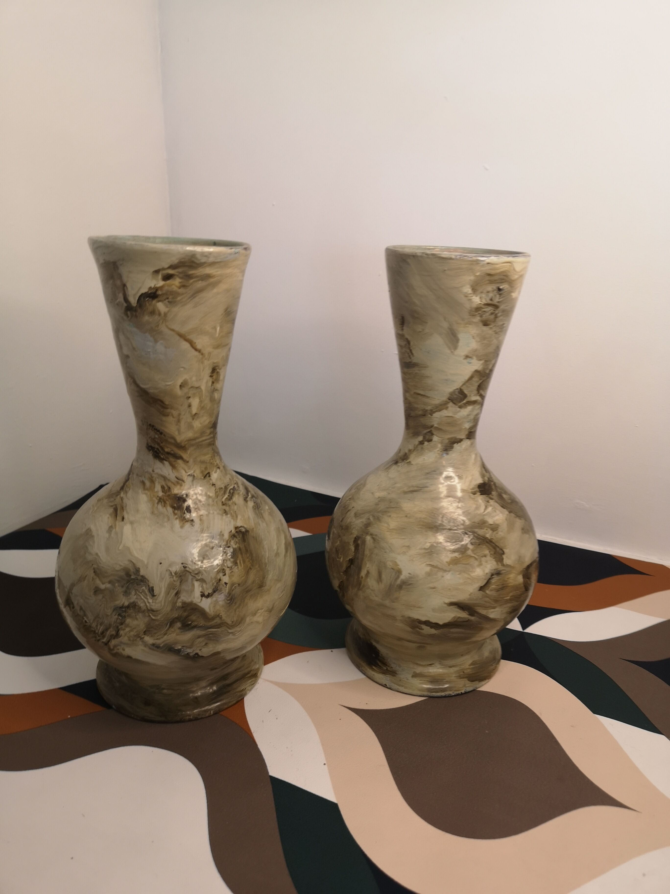 Pair of hand-painted terracotta vases