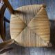 2 wooden chairs with cane