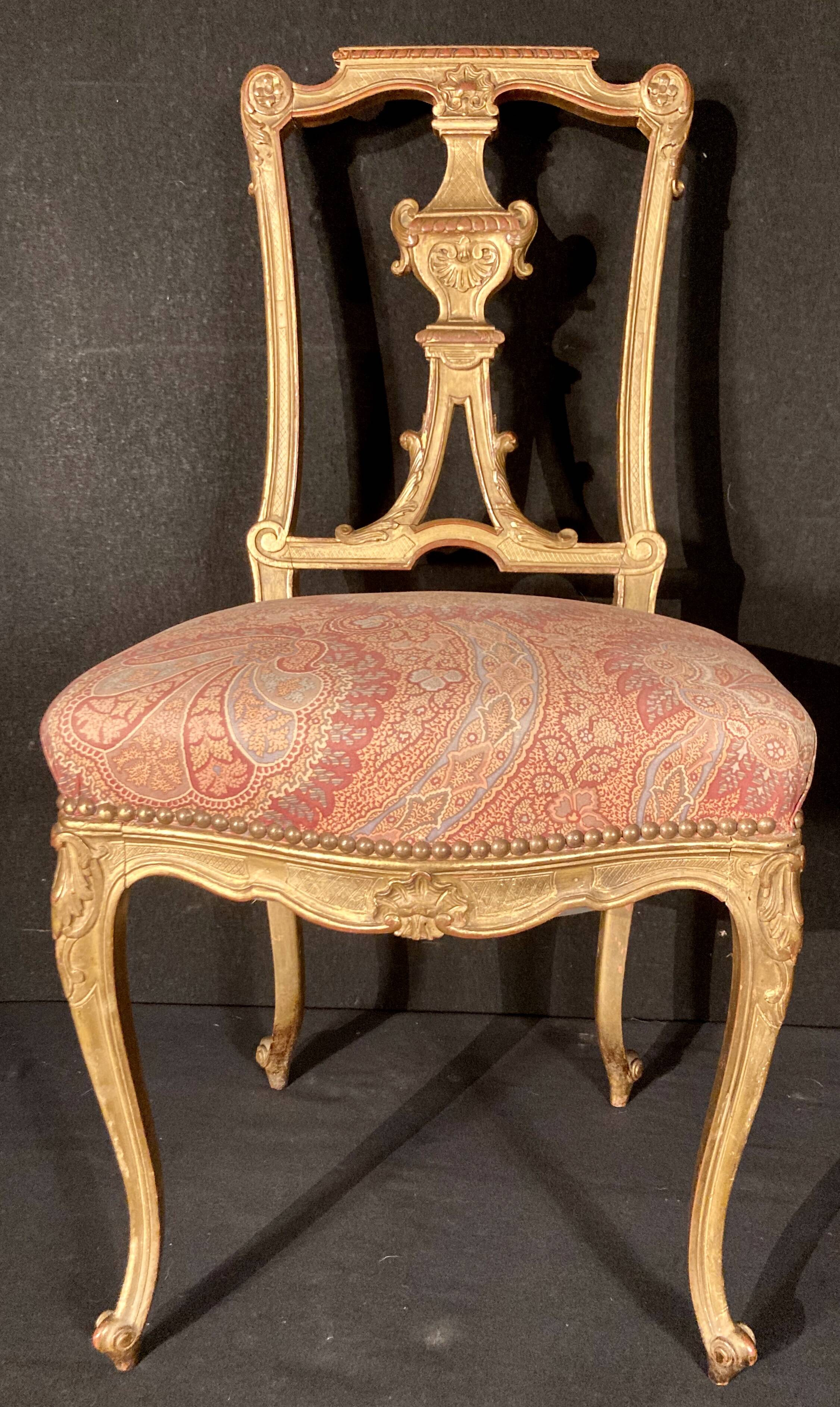 Pair of gilded wooden chairs