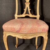 Pair of gilded wooden chairs