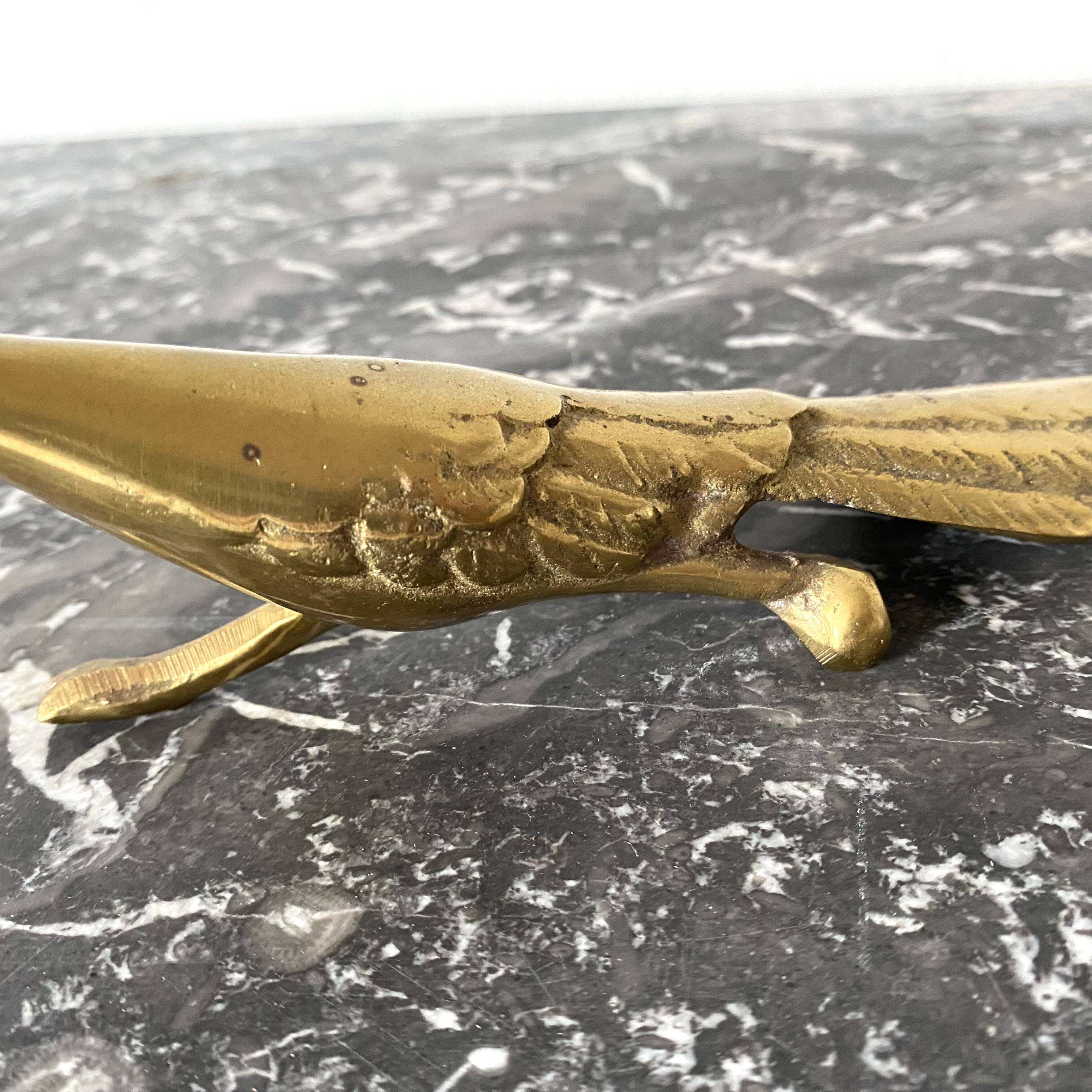 Golden brass bird