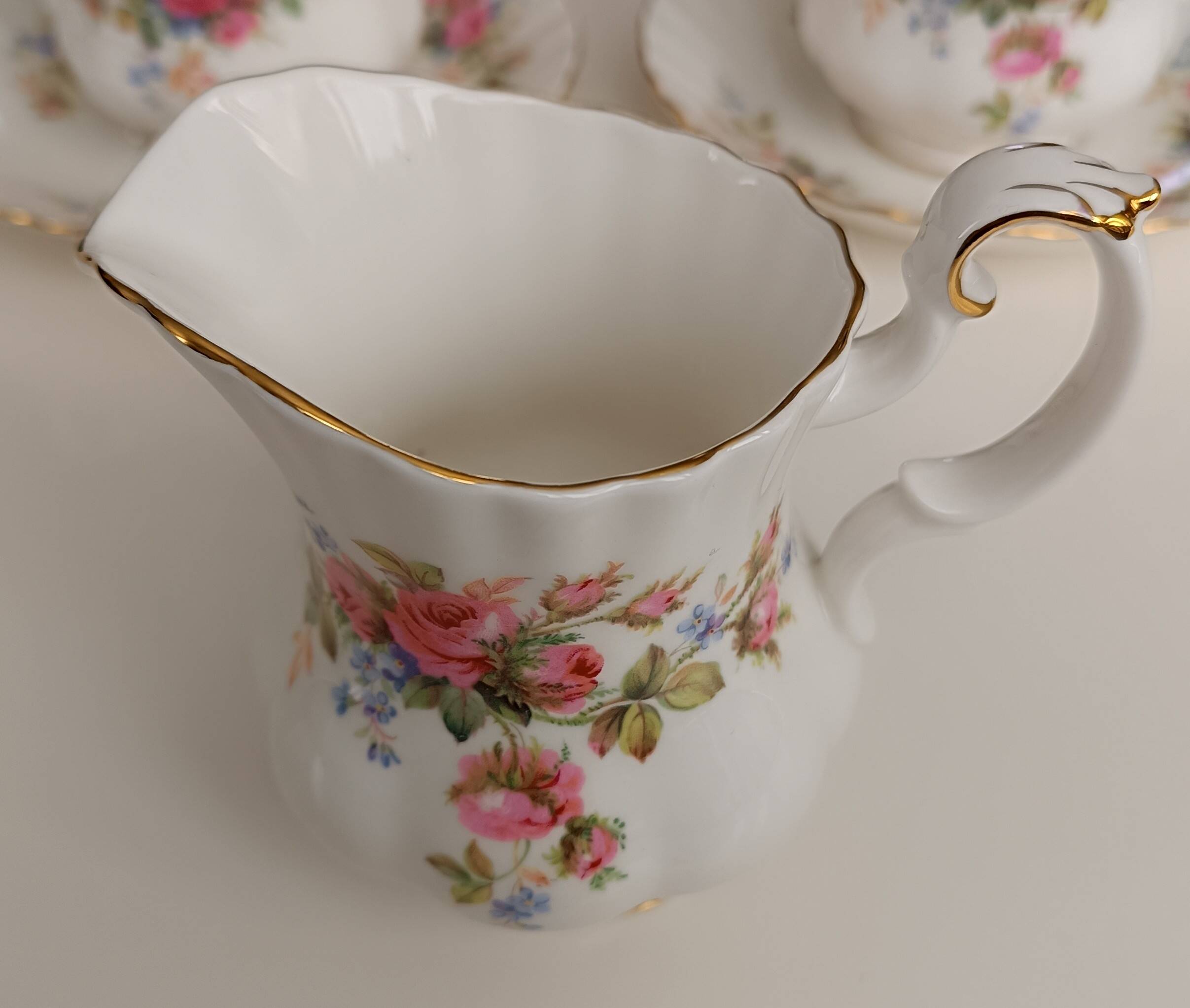 Royal Albert English porcelain set of 2 cups, saucers, and milk jug.