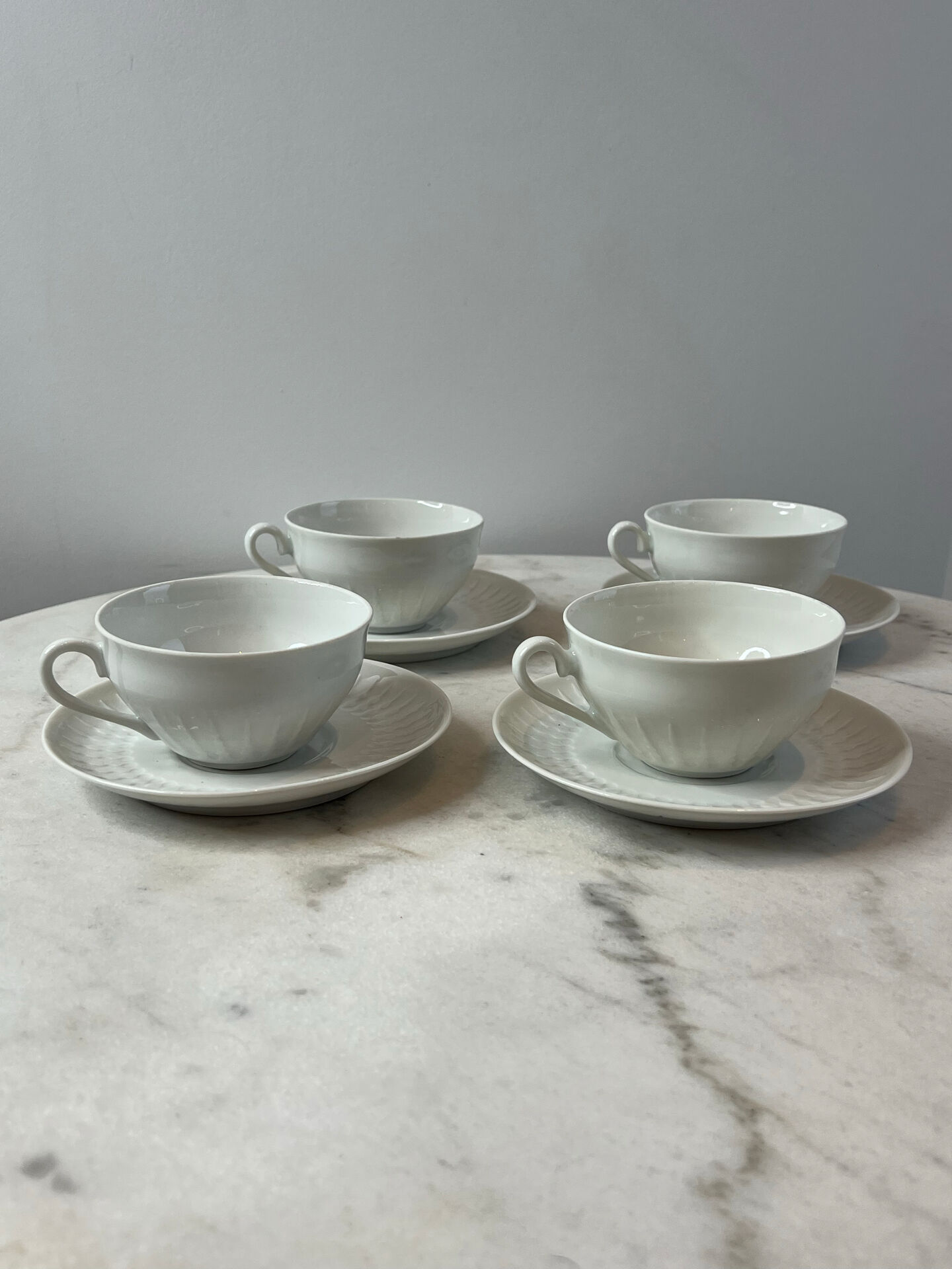 Set of 4 porcelain cups and saucers F. Chauvigny