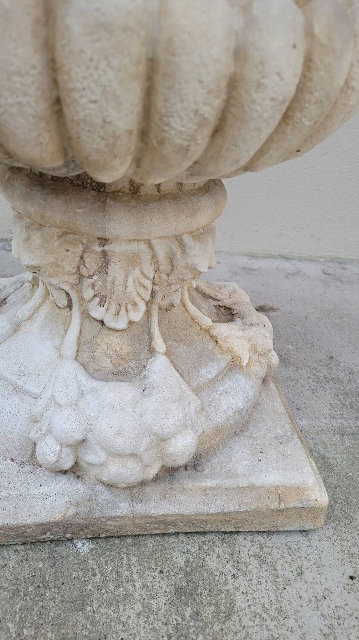 Pair of planter vases decorated with faces in reconstituted stone 1950s