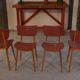 Ensemble de 4 chaises design chêne et skaï rouge 1960's