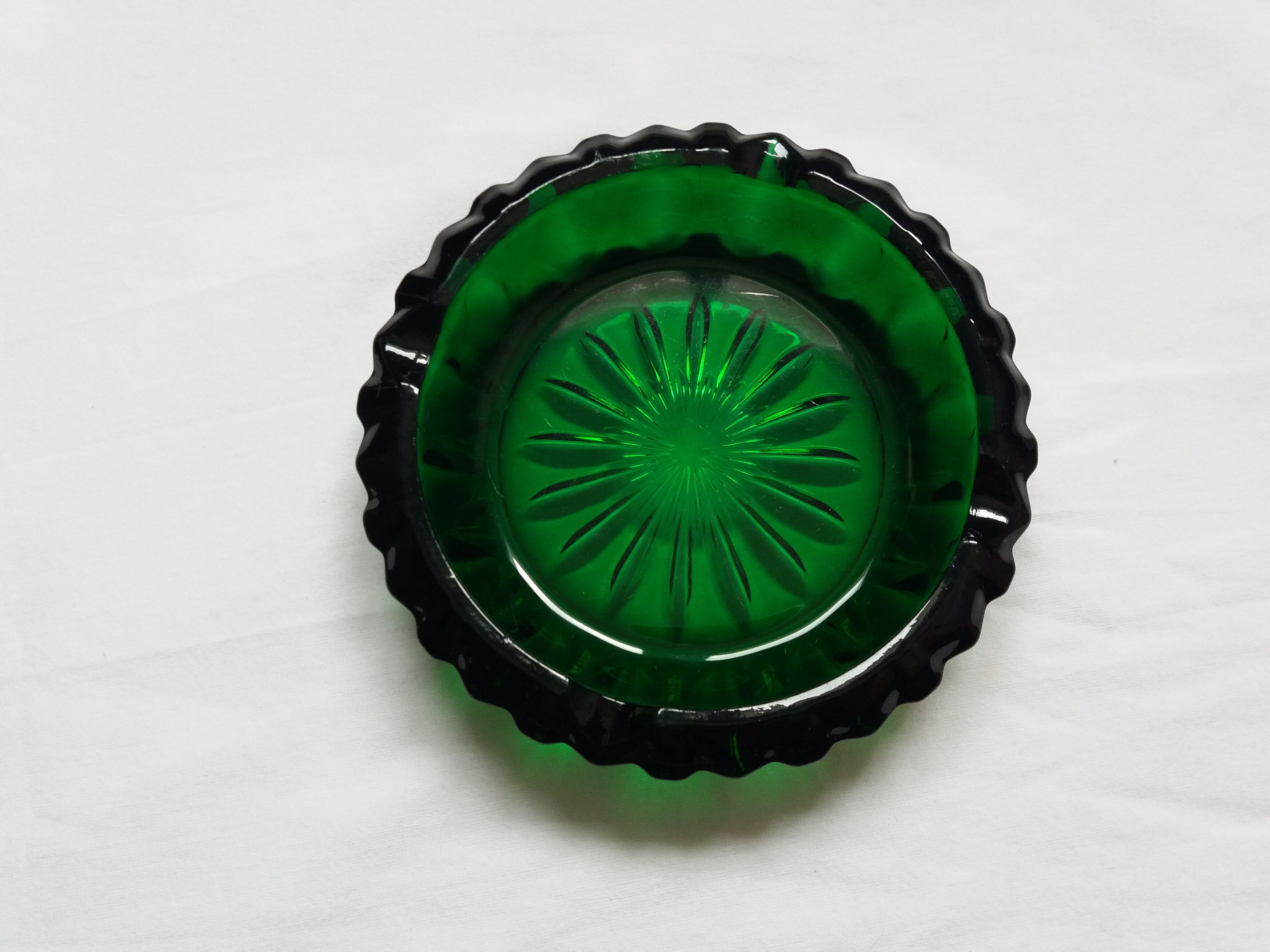 Green glass ashtray