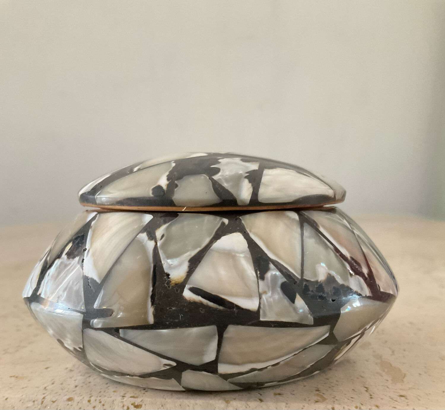 Empty vintage pocket in mother-of-pearl and wood