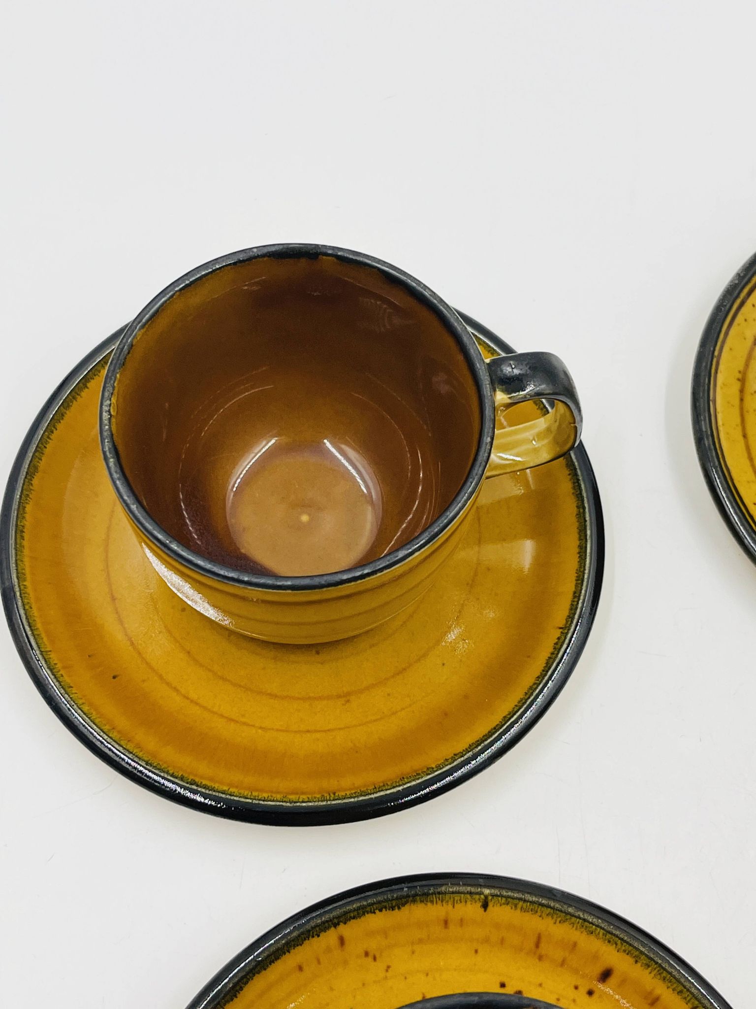 Set of four vintage Boch Palma cups and saucers.