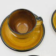 Set of four vintage Boch Palma cups and saucers.
