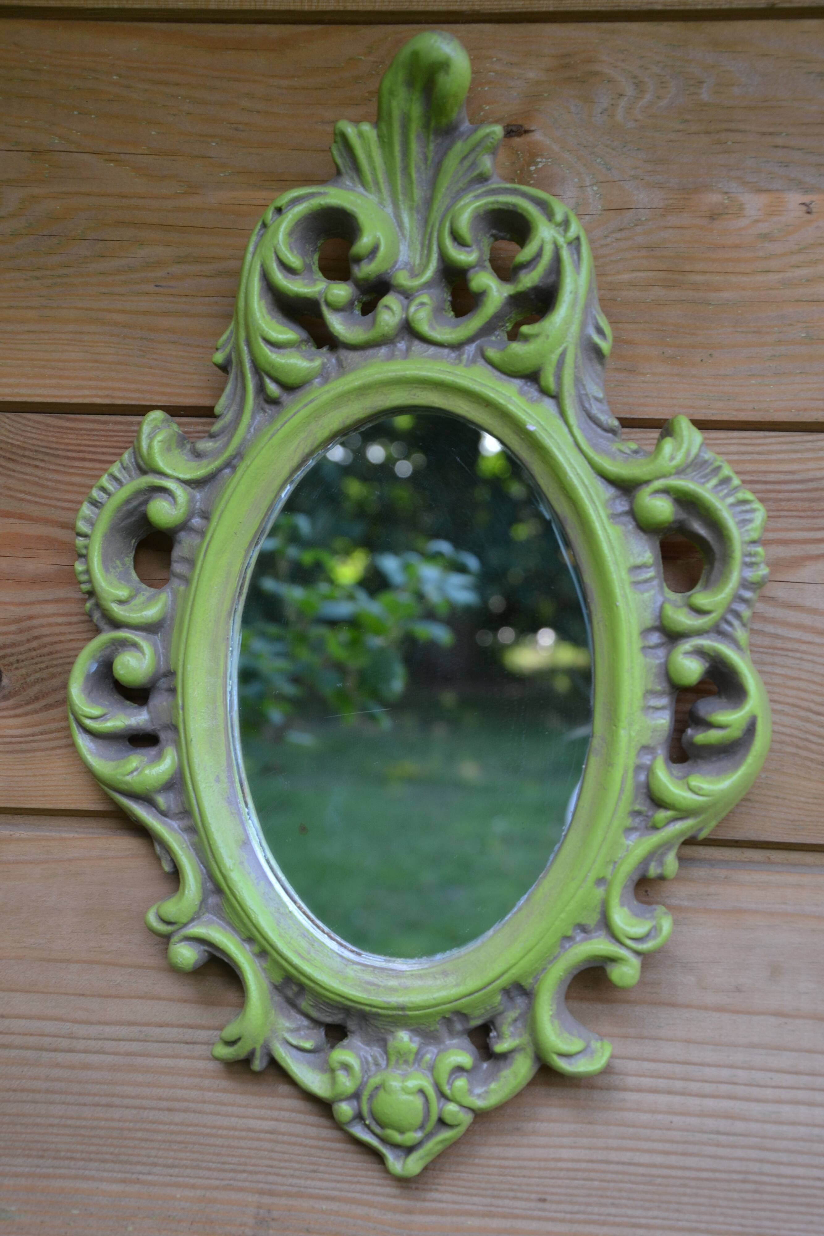 Small green wooden mirror