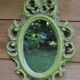 Small green wooden mirror