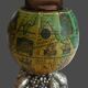 Vintage antique lighter with a globe and silver-plated stand.