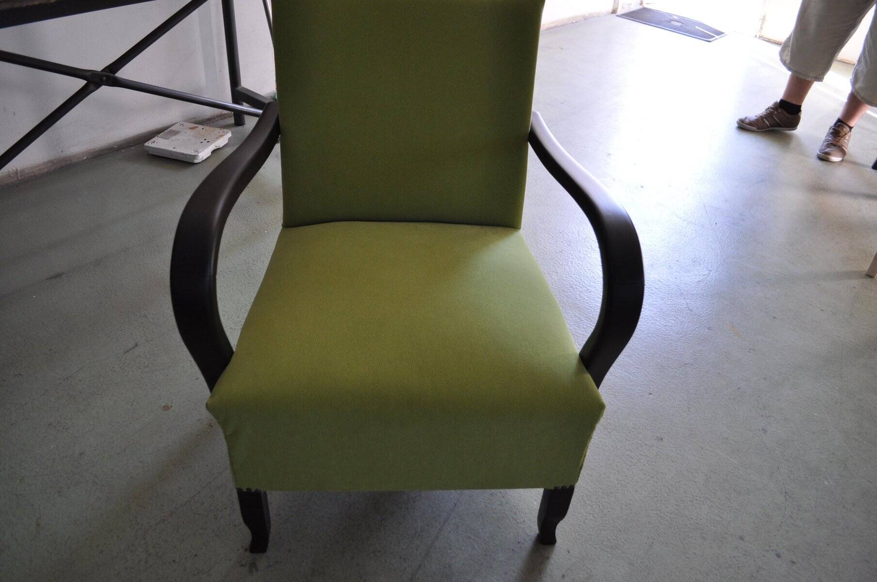 Art Deco armchair in chartreuse green and black wood, fabric upholstery, 1920s.