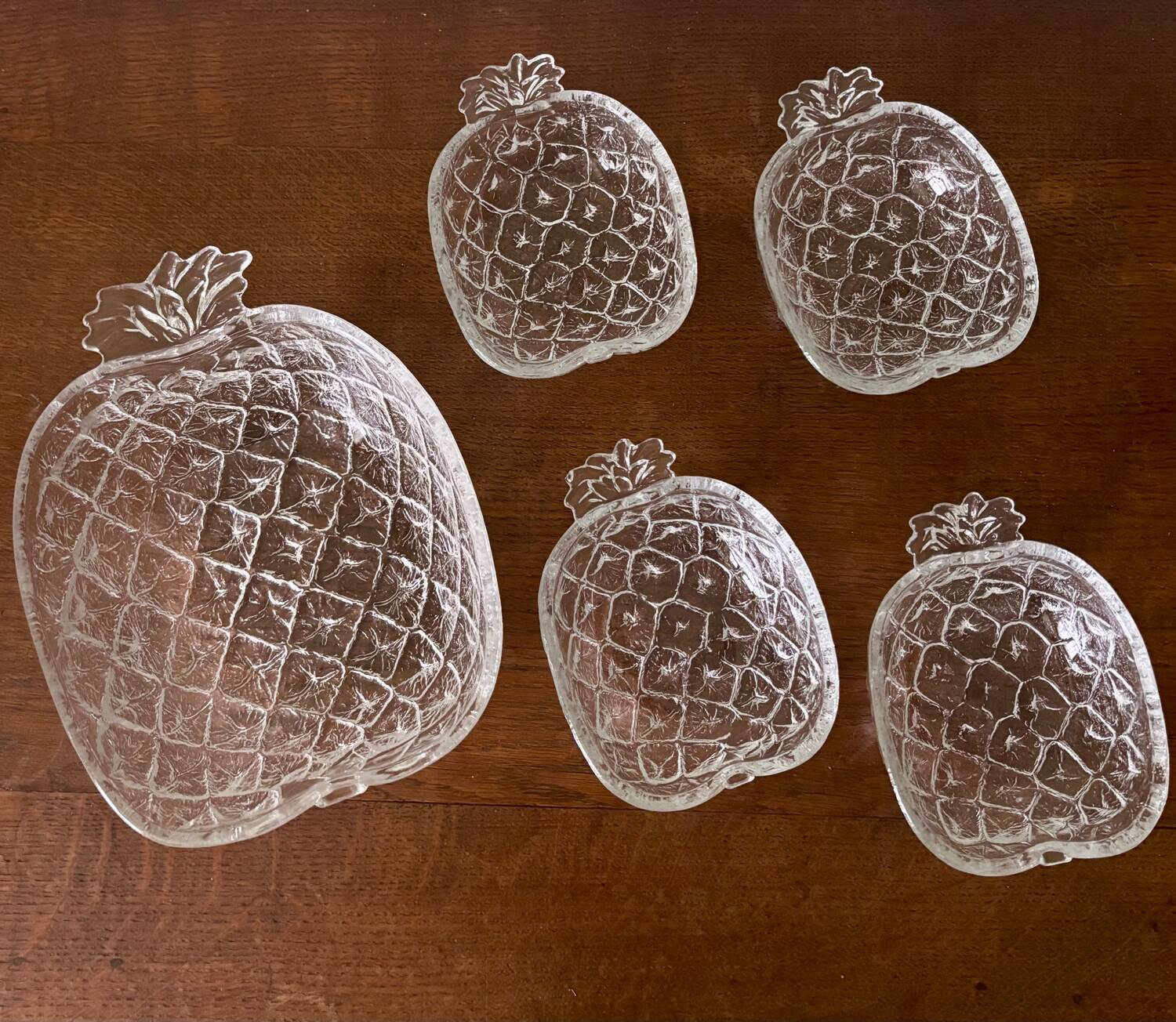Vintage fruit service in moulded glass pineapple design.