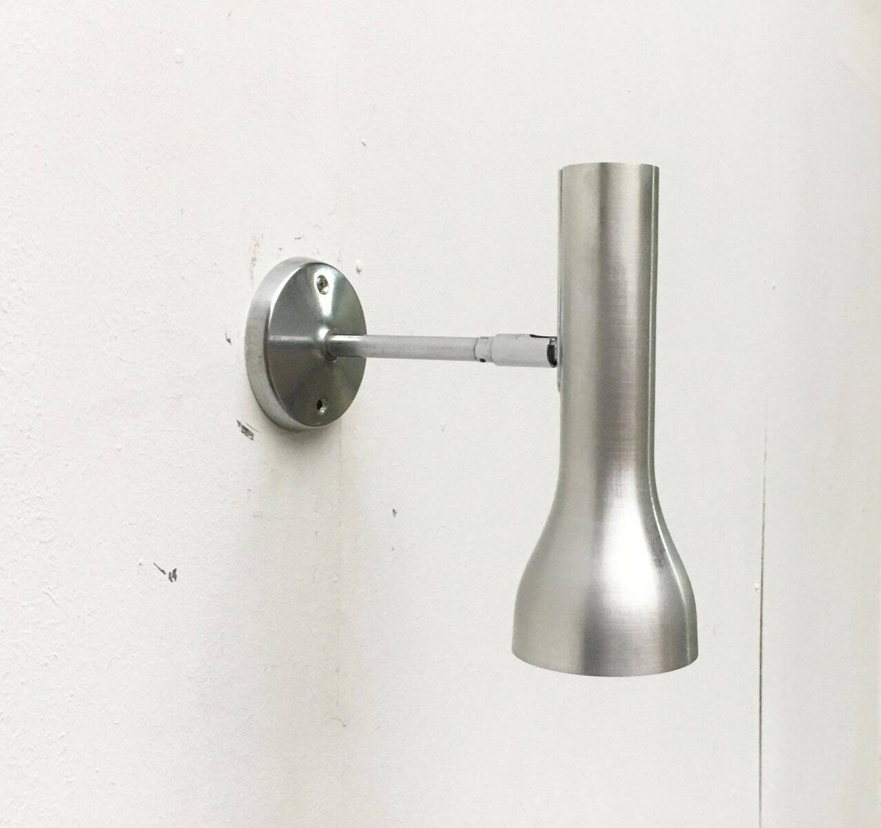 Mid-century wall sconce by the SLZ team for Swisslamps International.