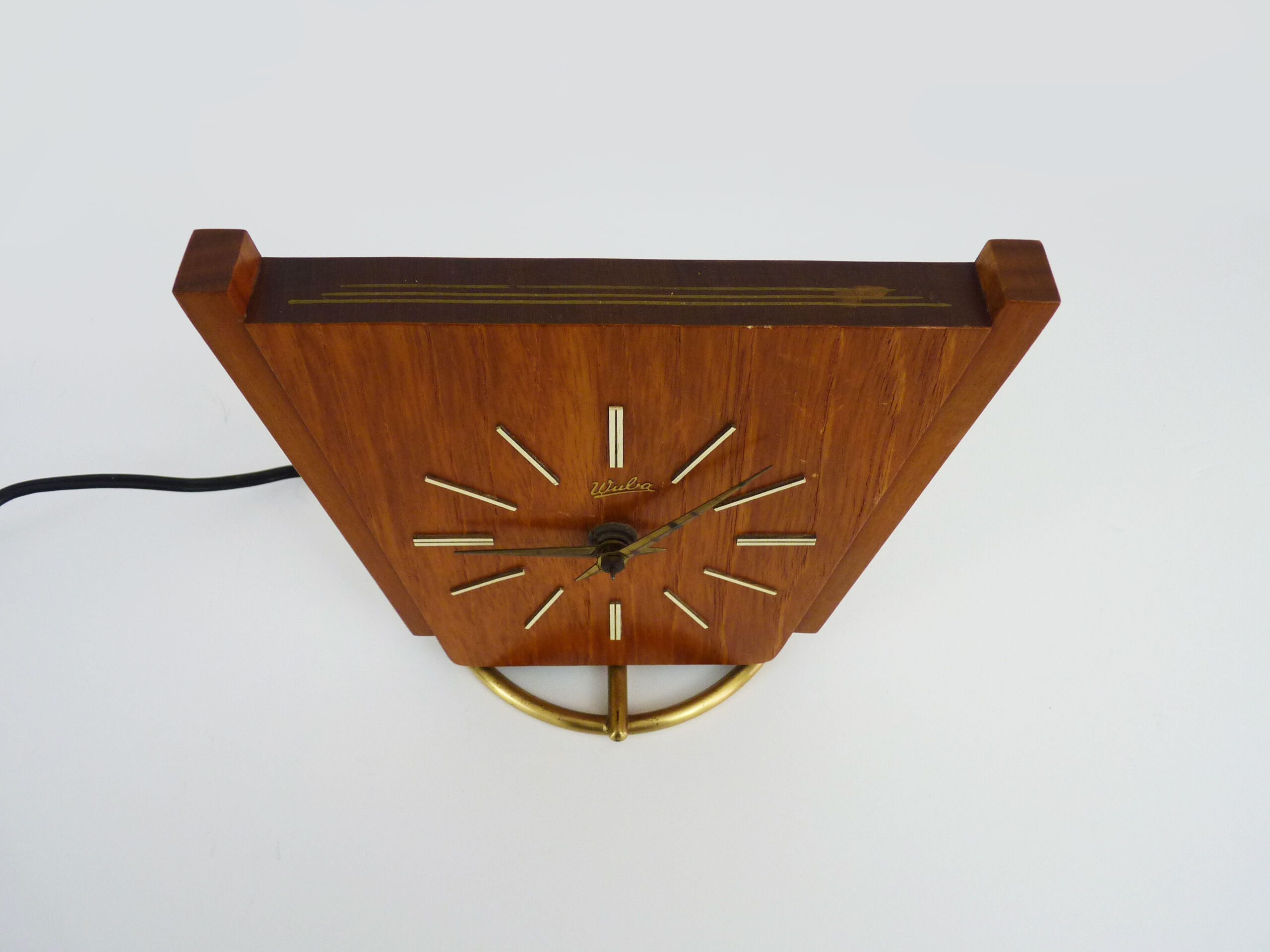 Table clock, art deco clock in Wuba Amsterdam in wood and brass. Year 50