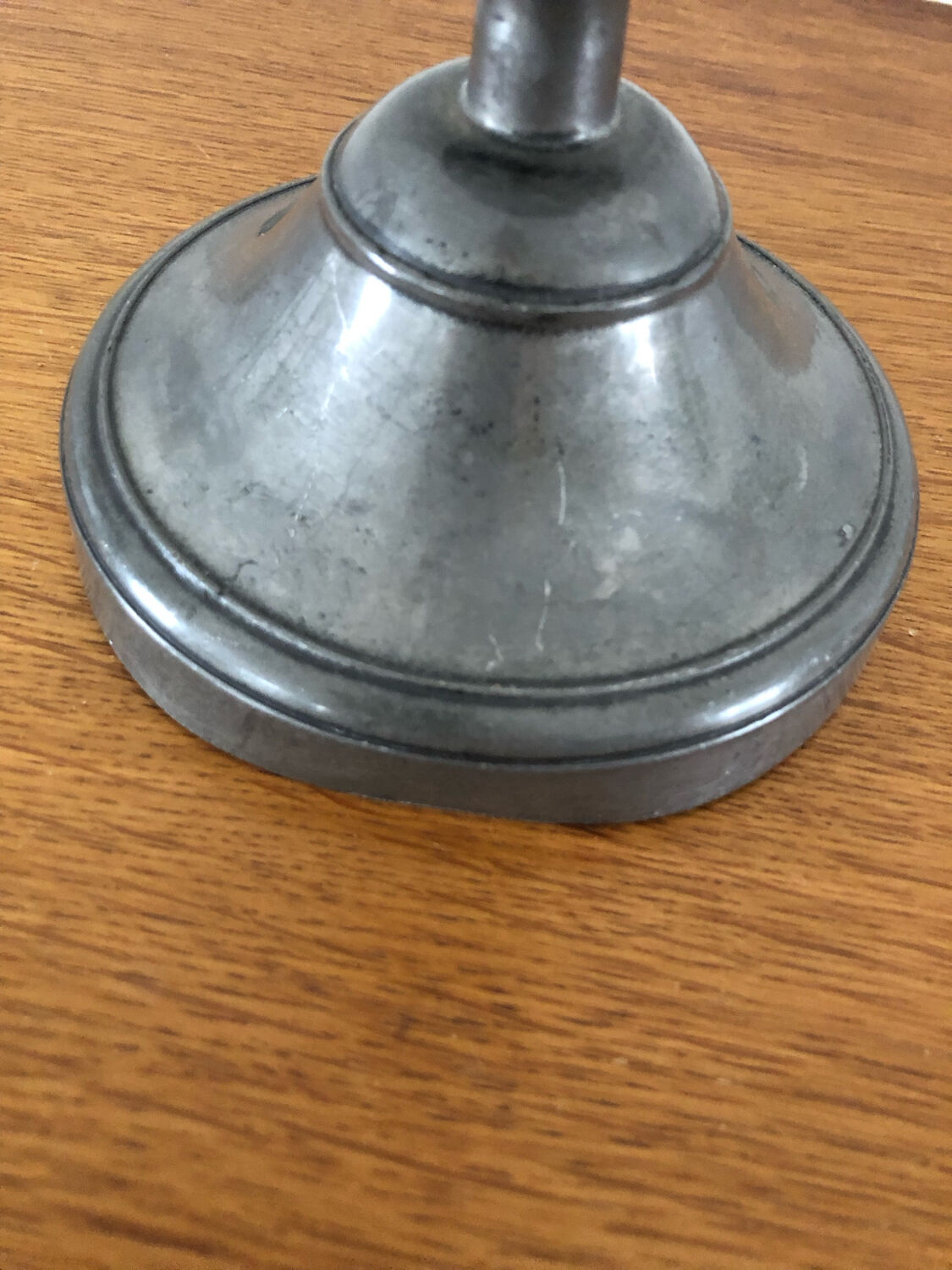 Antique pewter candle holder
