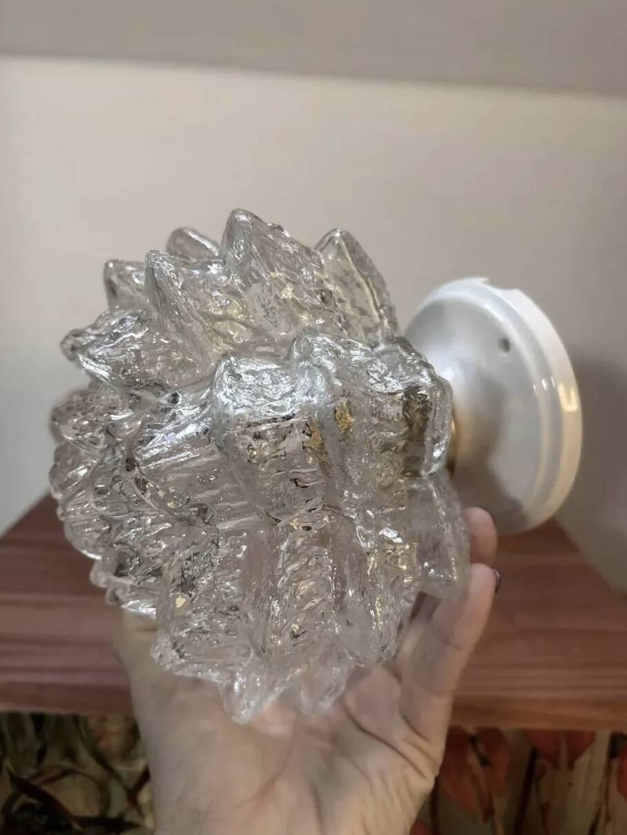 Pair of wall sconces in glass flower shape