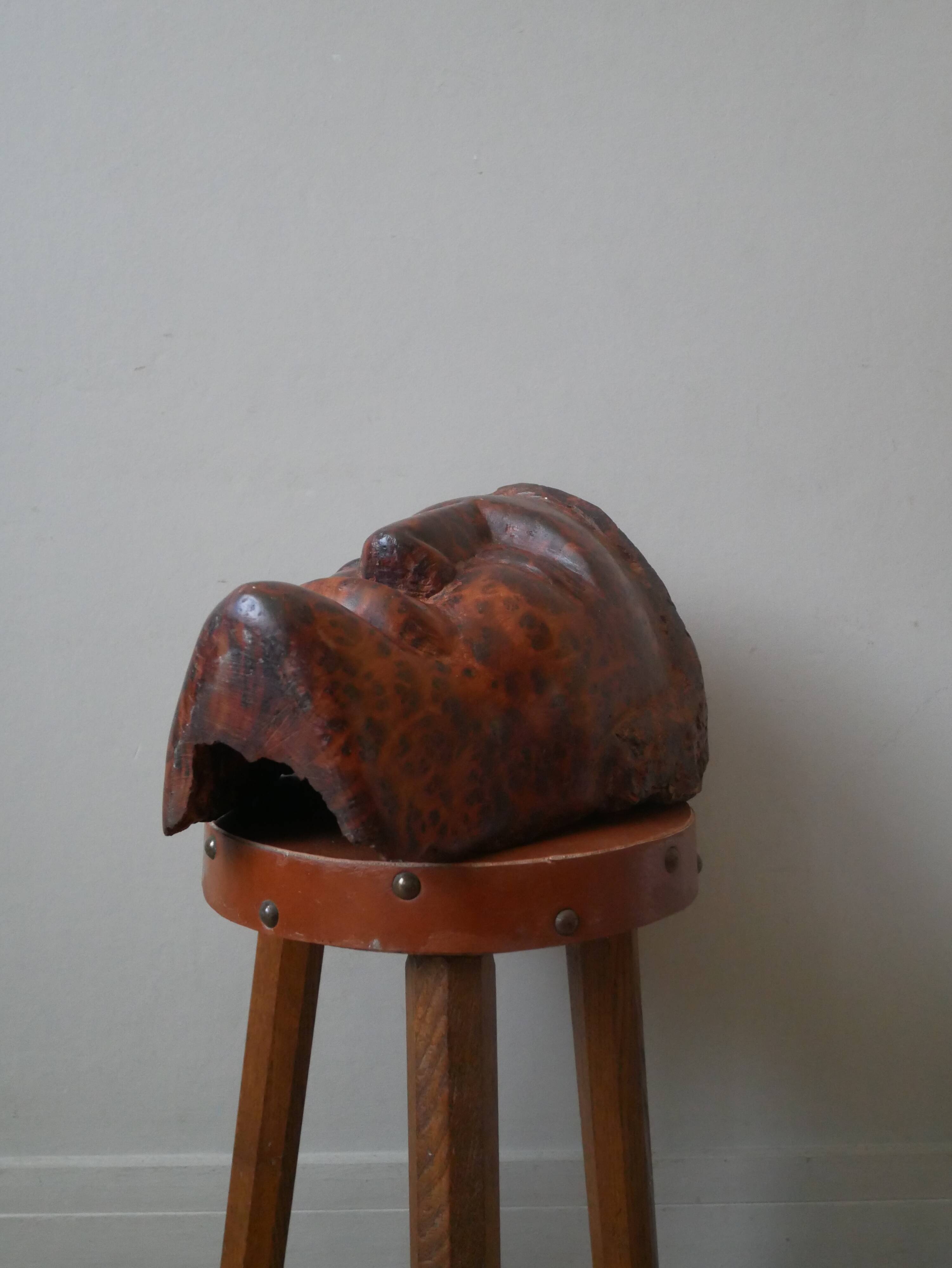 Wooden sculpture ethnic man's head handcrafted tribal decorative object workshop