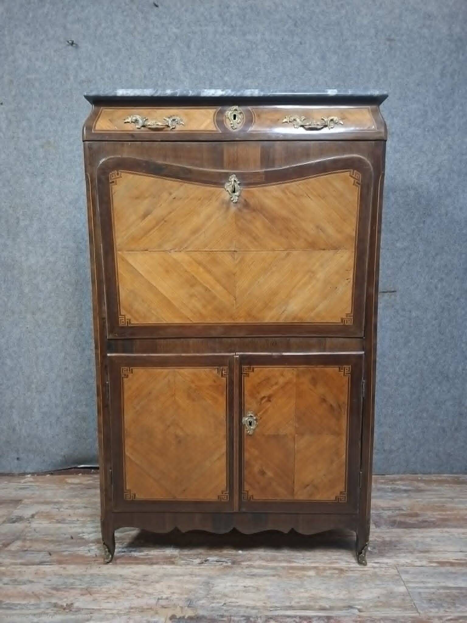 Louis XV period secretary in marquetry and veneer, 18th century.