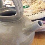 Clay-hued sandstone pitcher