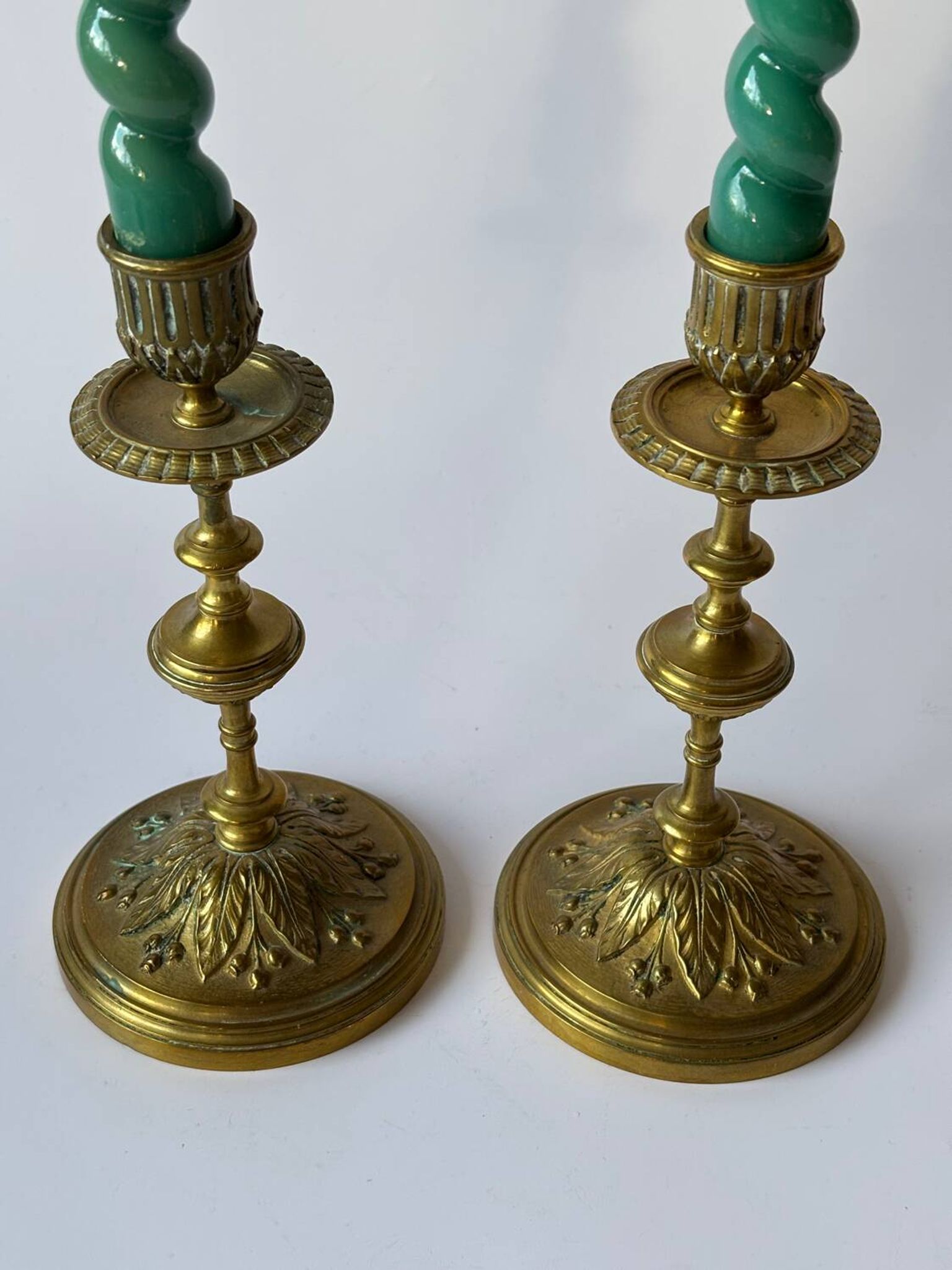 Pair of neoclassical brass candlesticks