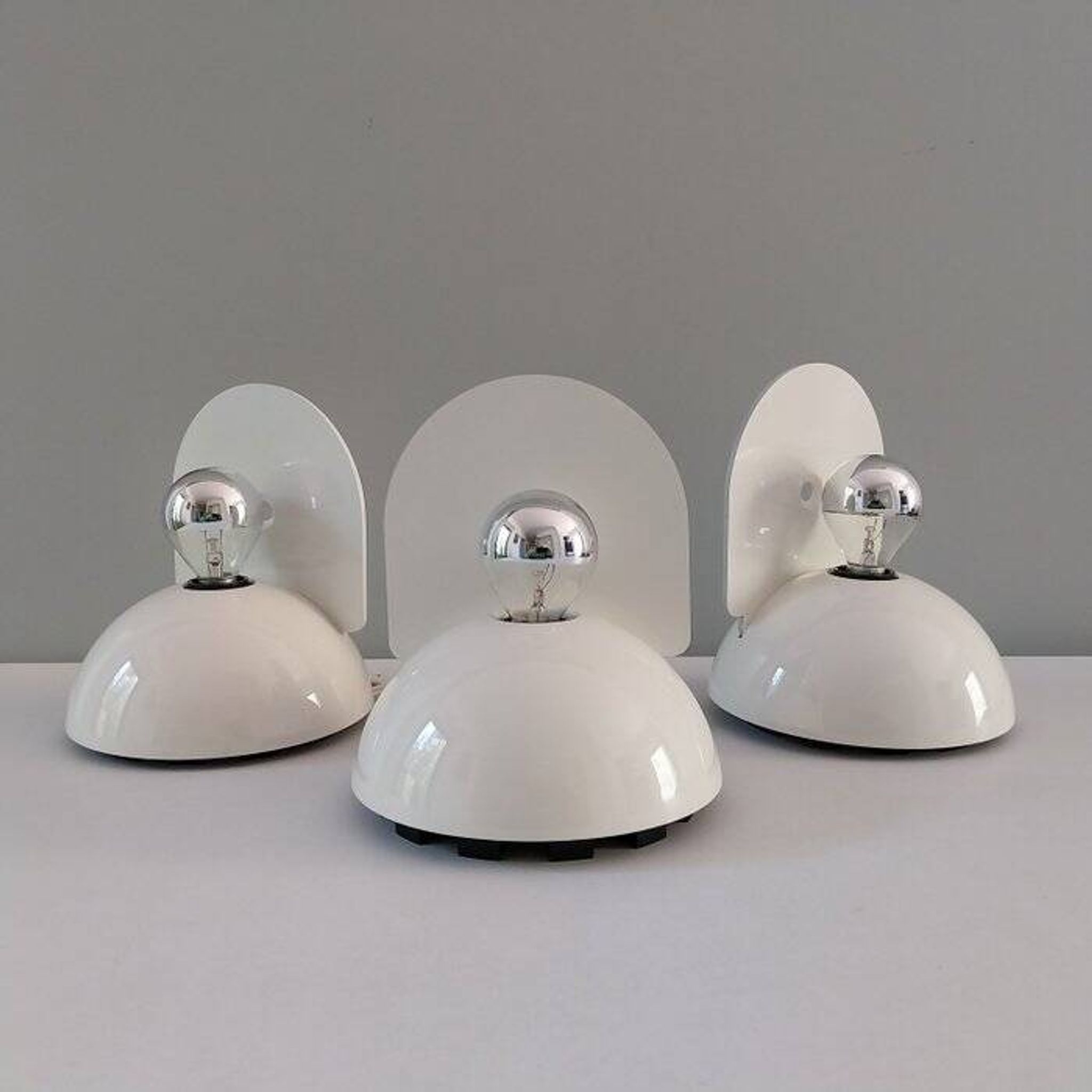 Set of 3 Artemide “Buco” lamps by Claudio Bini