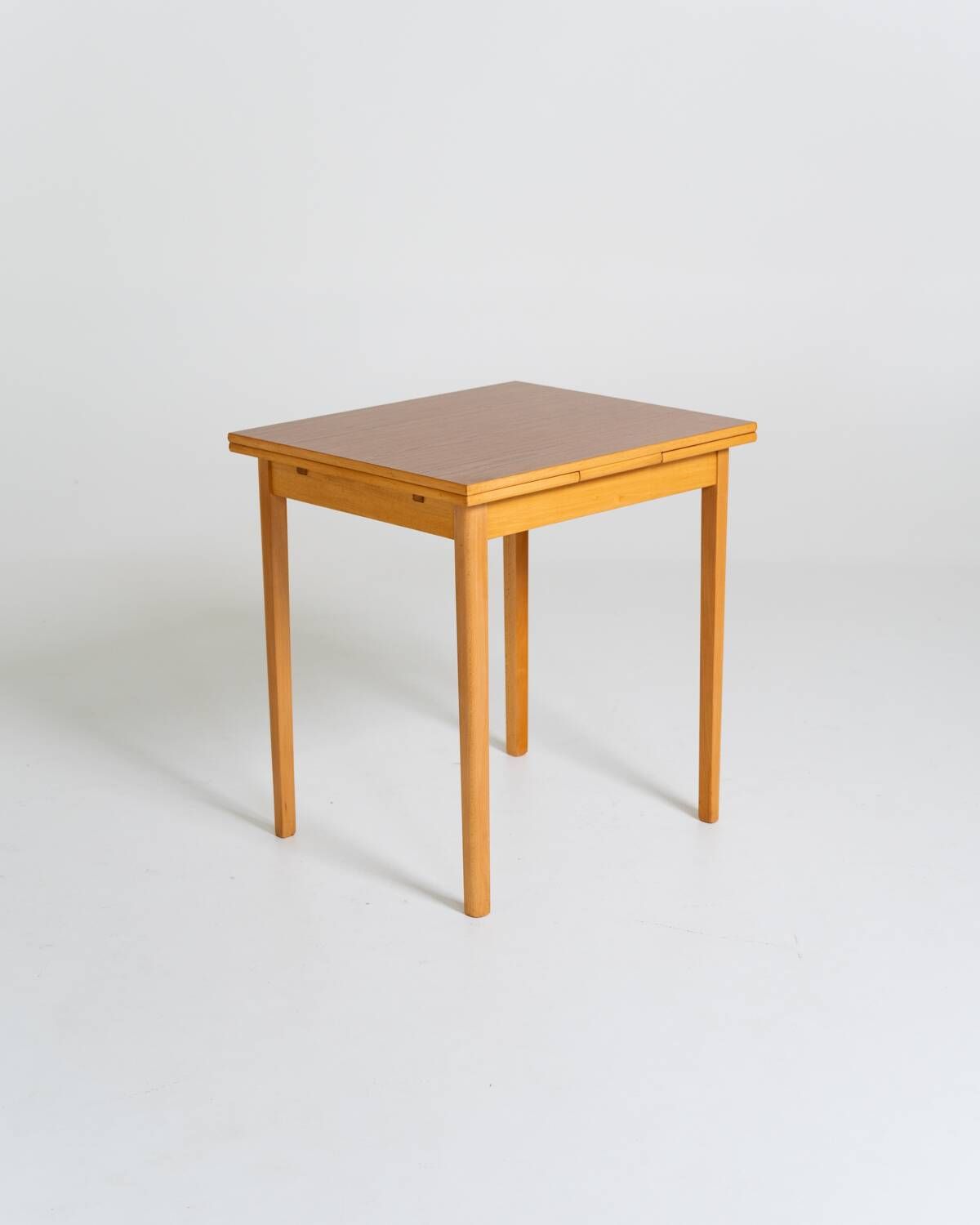 Extendable dining table in laminate and beech, Sweden, 1950s-60s