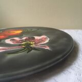 Underside of flat ceramic pink flowers La Roue de Vallauris