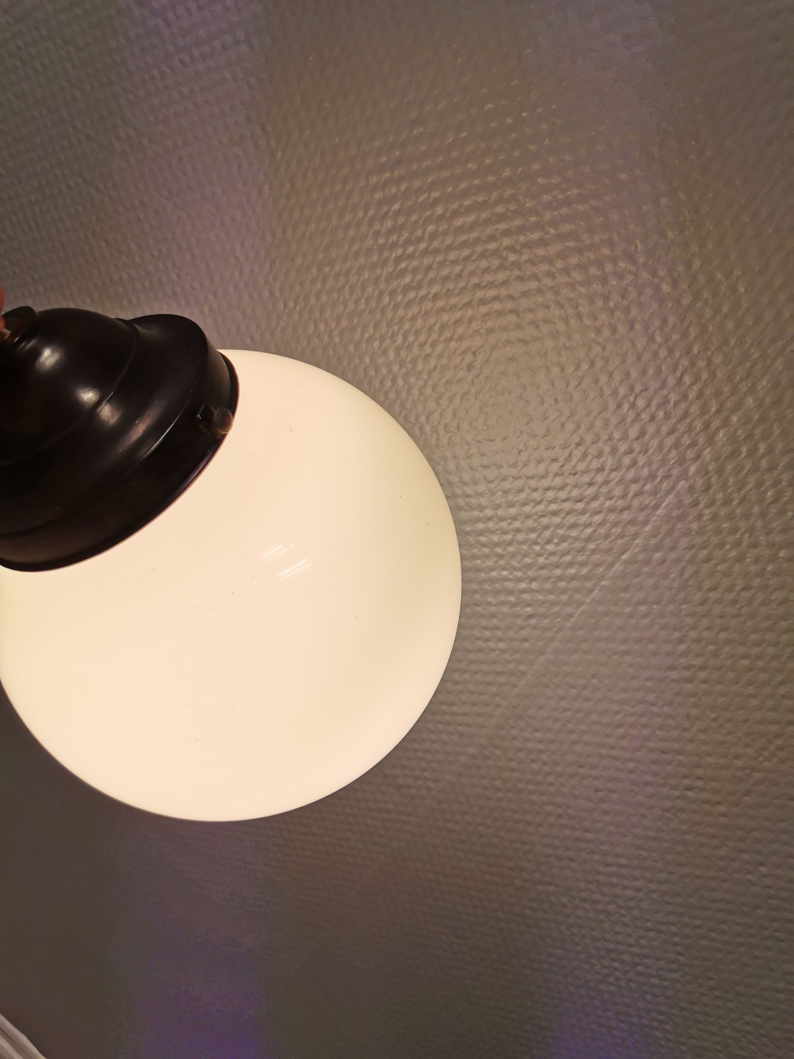 Small Art Deco hanging lamp in cream coloured glass and bakelite top.