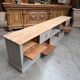 Old workshop furniture transformed into a TV unit.