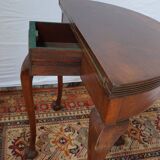 A half-moon english mahogany games table