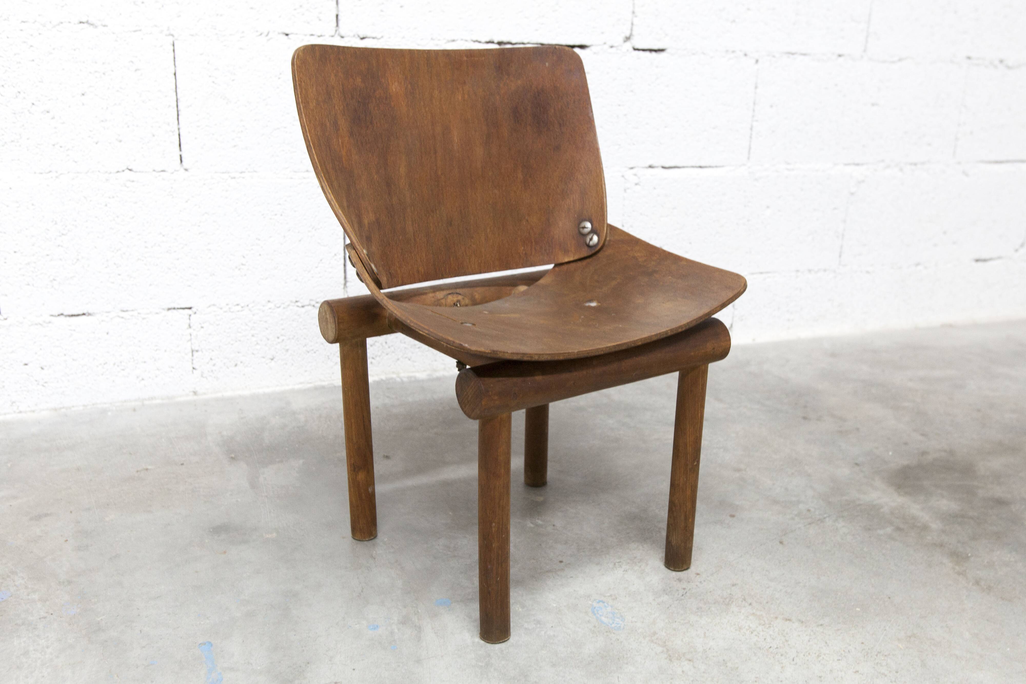 Atypical 1960s curved wood children's chair