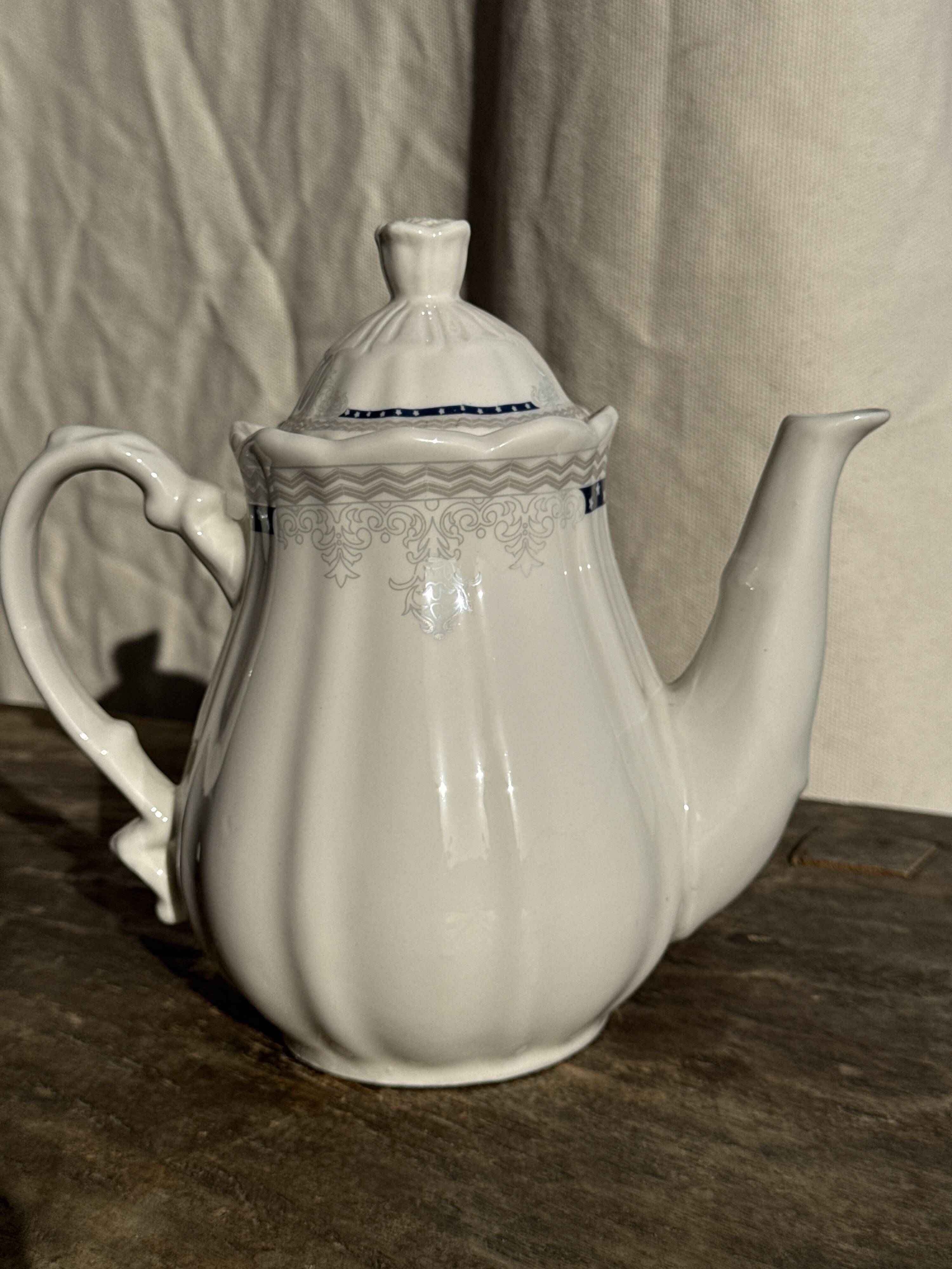 White earthenware teapot with blue and silver trim H22.5