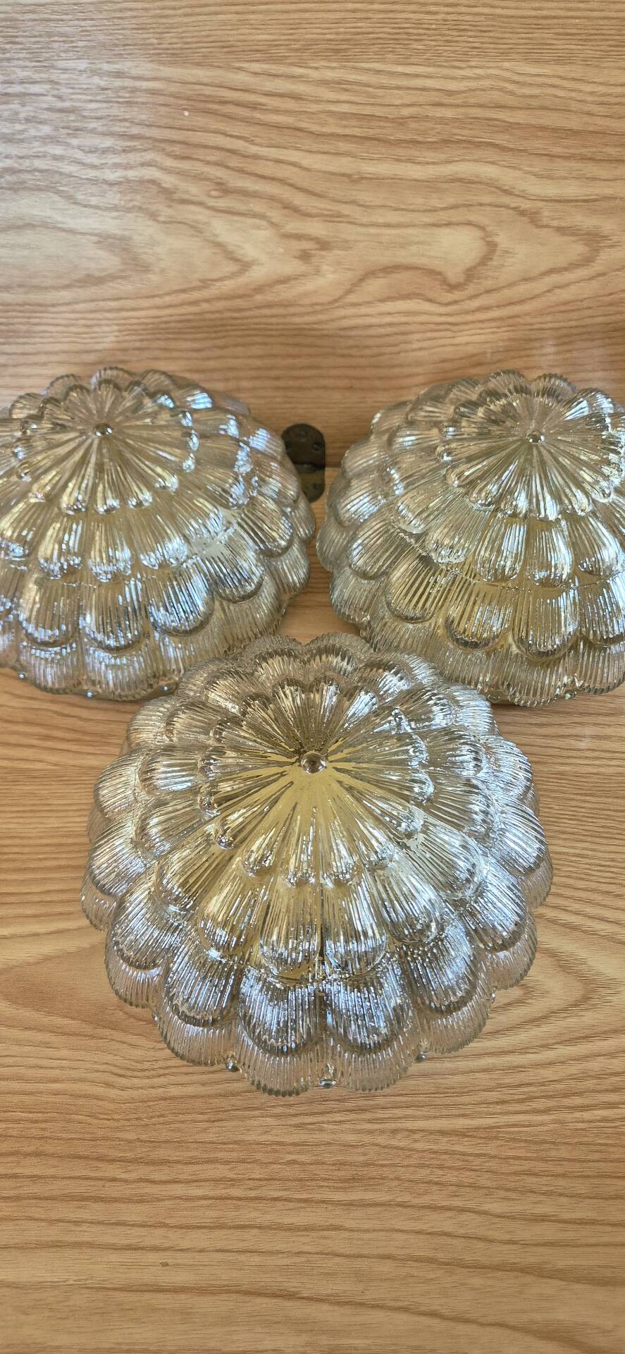 Set of 3 vintage amber moulded glass wall lights and ceiling lights.
