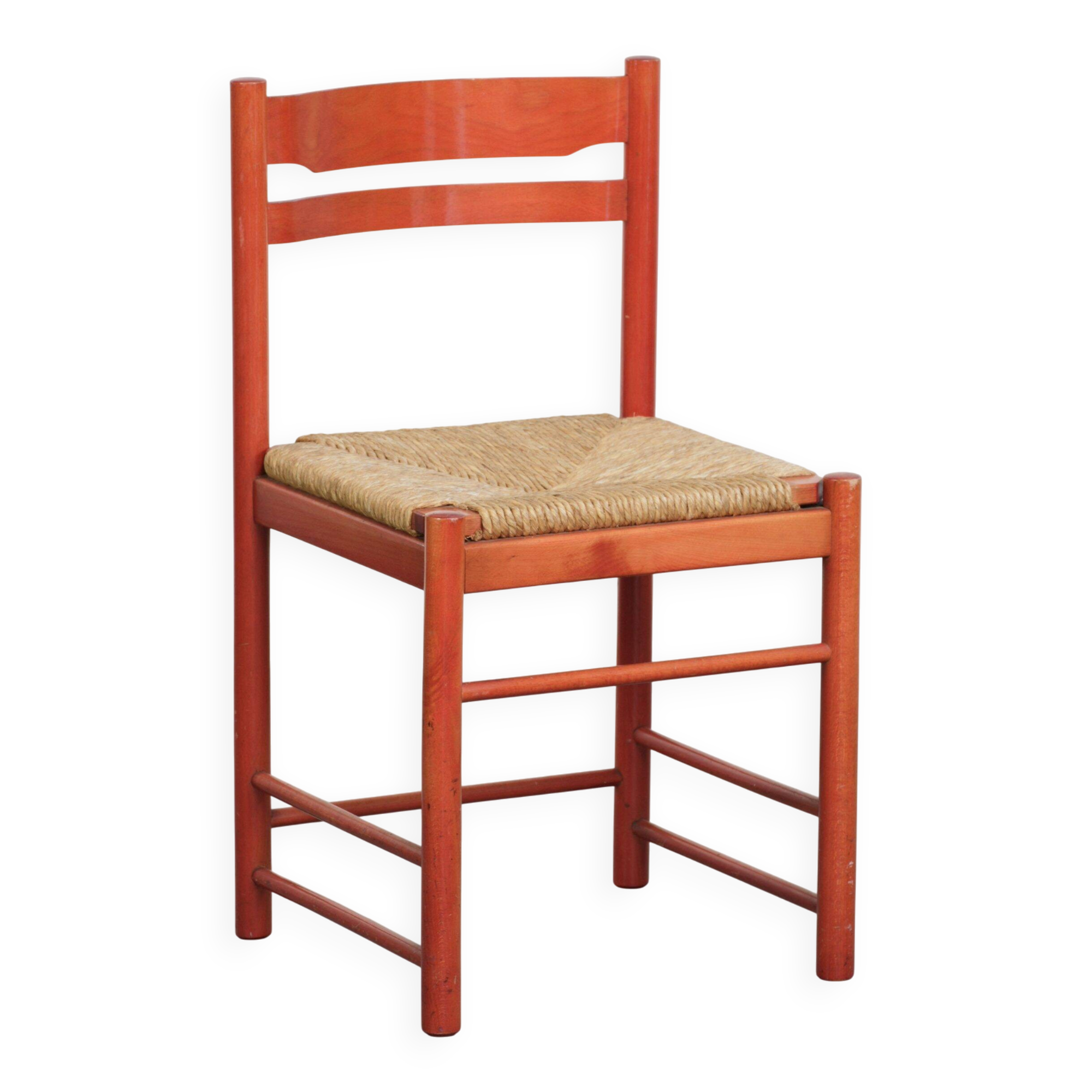 Nice red vintage wooden chair from the 1970s with a woven wicker seat