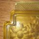 Pressed glass yellow bowl with floral pattern by Portieux.