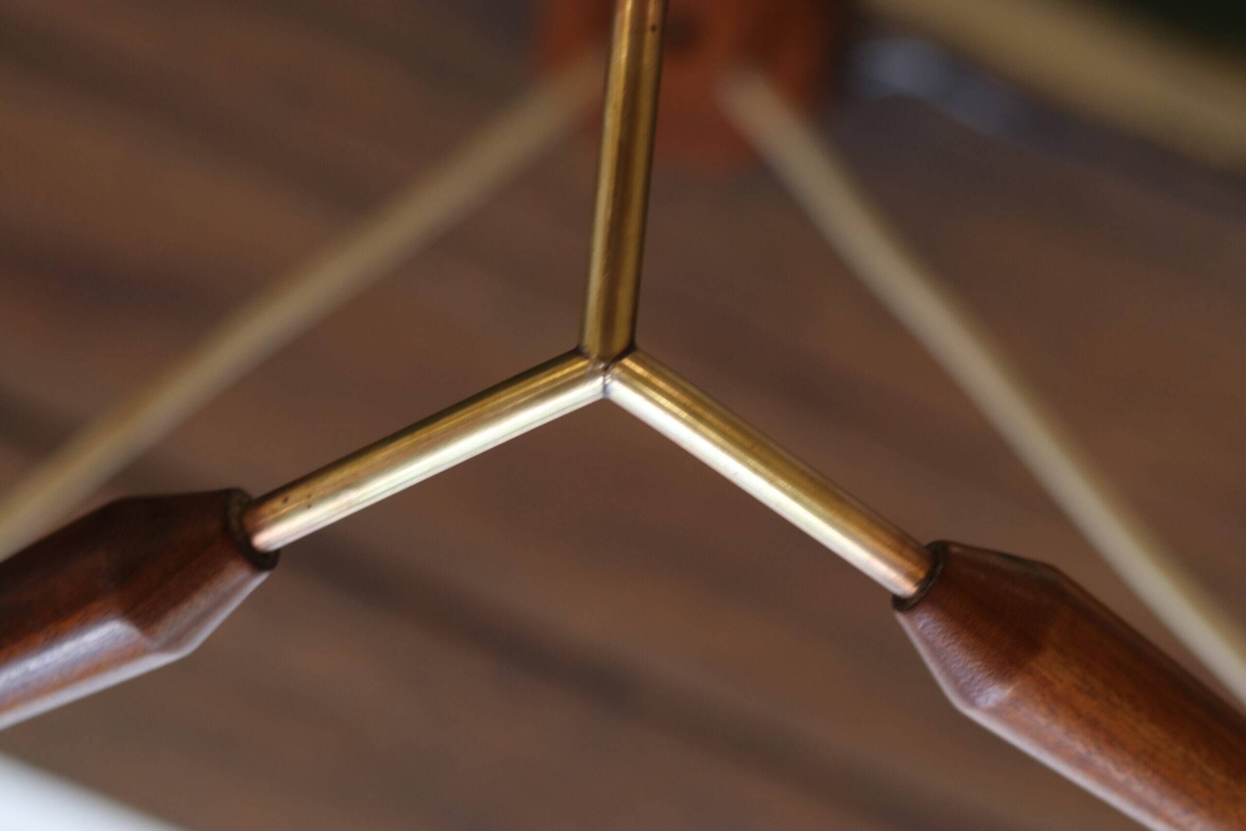 Scandinavian chandelier "Cascade" from the 1960s in brass, teak, and smoked glass.