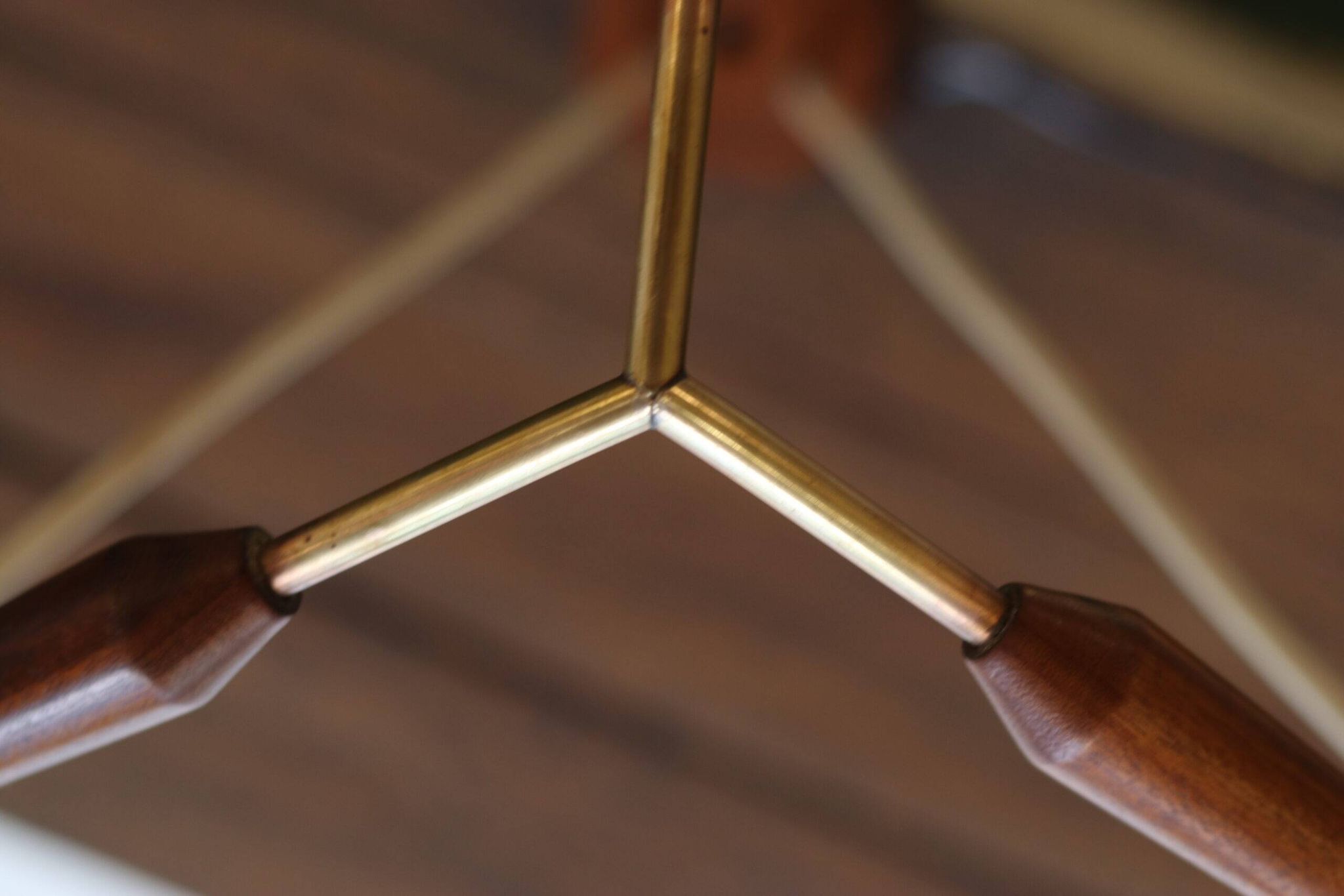 Scandinavian chandelier "Cascade" from the 1960s in brass, teak, and smoked glass.