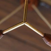 Scandinavian chandelier "Cascade" from the 1960s in brass, teak, and smoked glass.