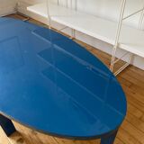 Oval coffee table in blue lacquered wood