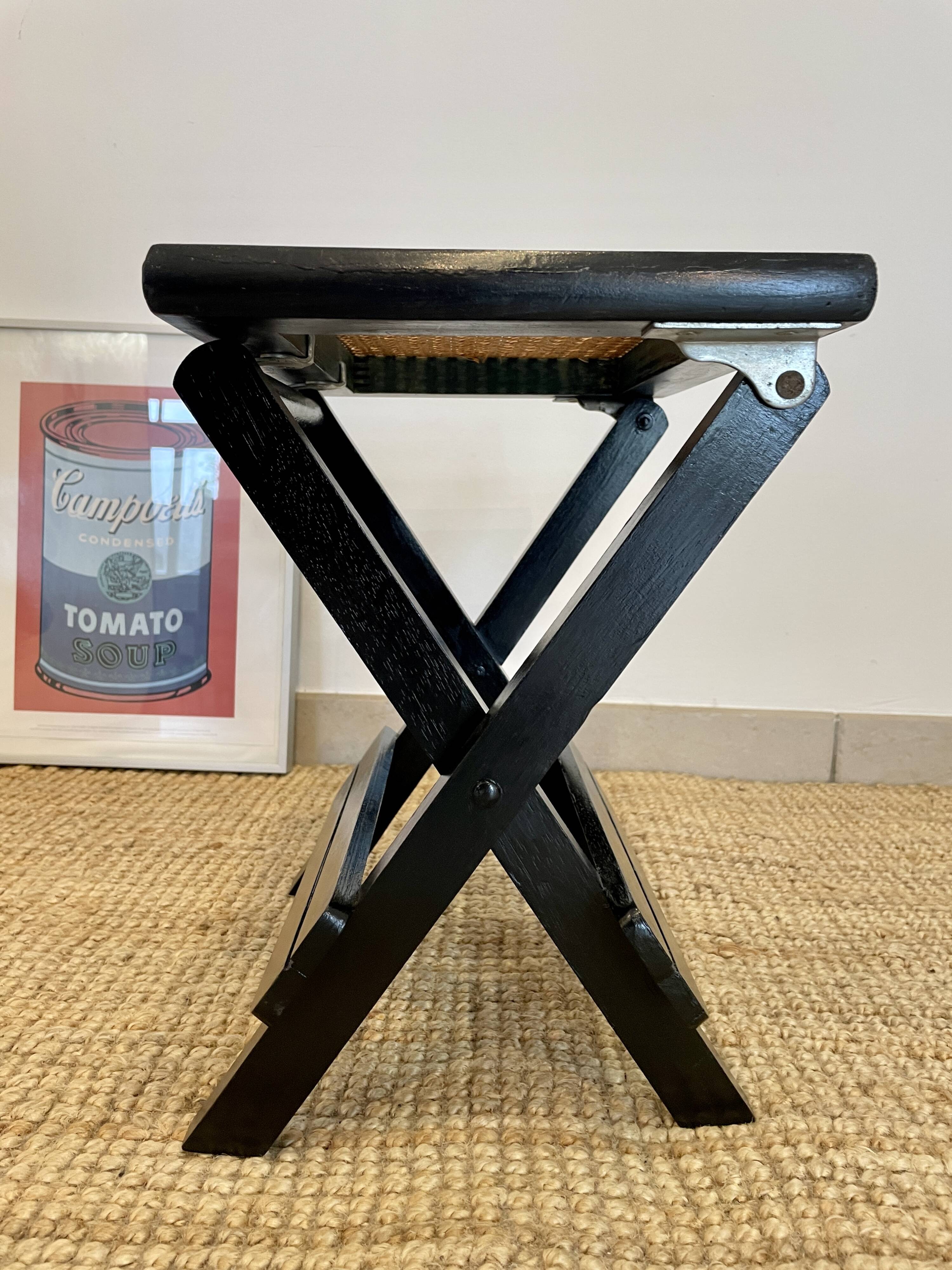 Tabouret pliable en cannage