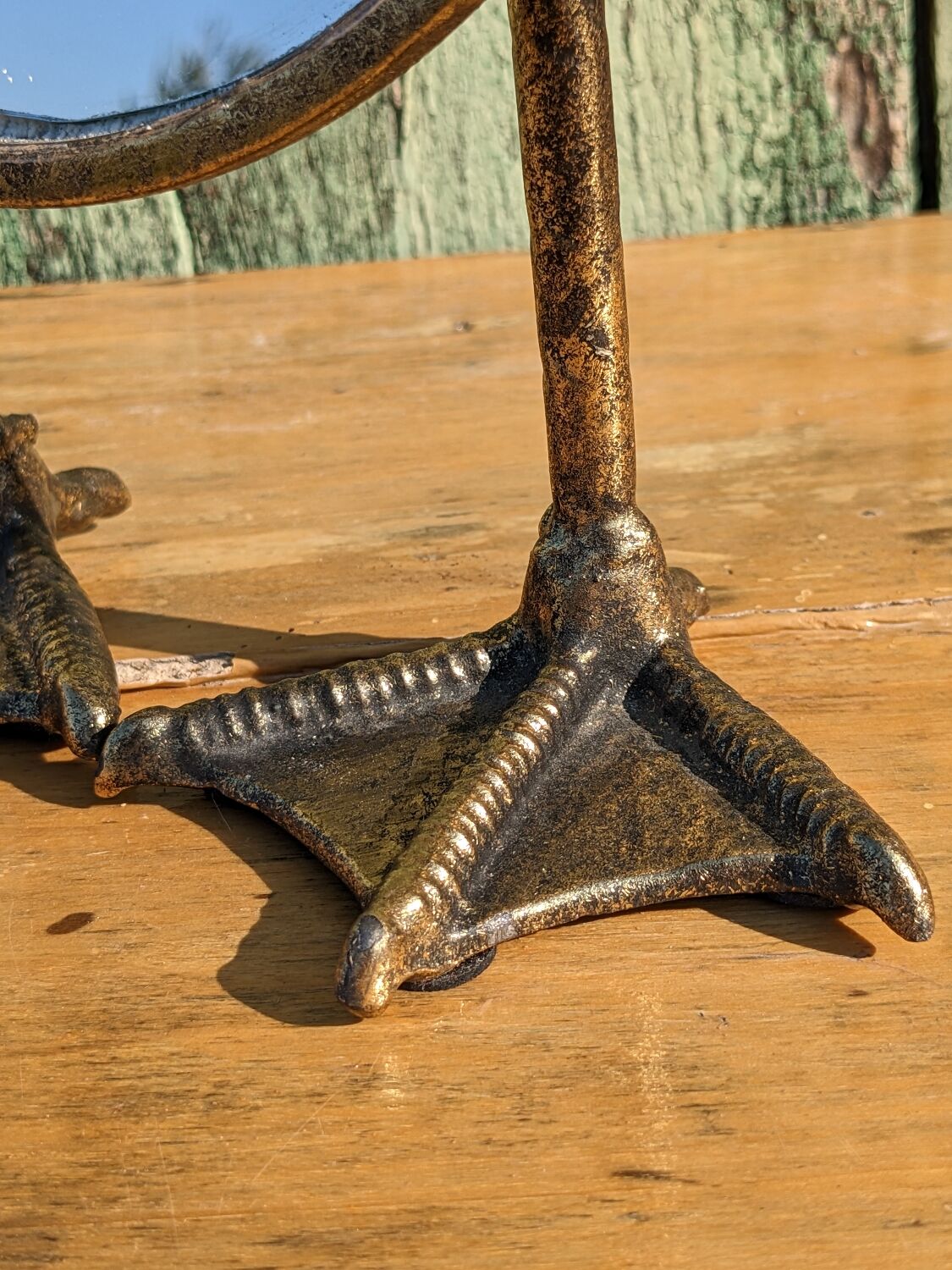 Metal mirror with duck legs