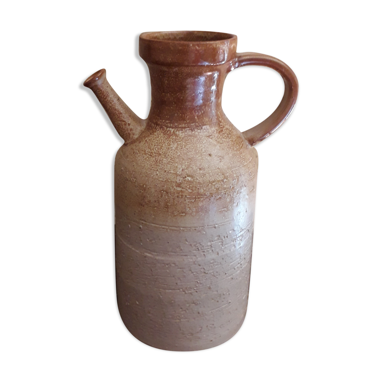 Vintage kid jug in two-tone sandstone with a handle and spout