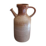 Vintage kid jug in two-tone sandstone with a handle and spout