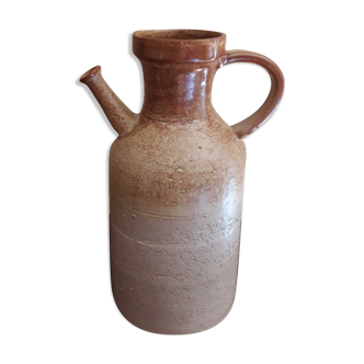 Vintage kid jug in two-tone sandstone with a handle and spout