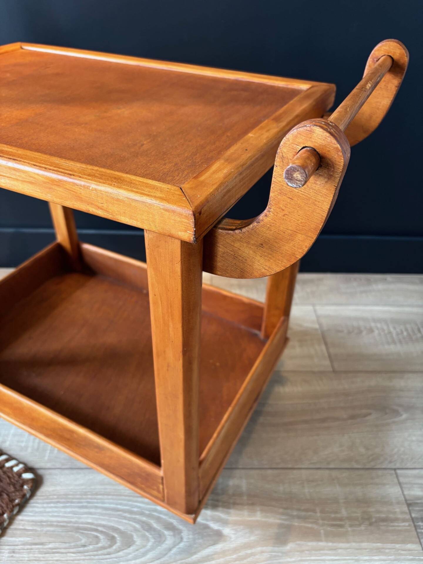 Vintage wooden trolley on wheels